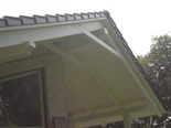 EFH mit Erkerspiess für Gallerie und extrawaganter Dachüberstaende